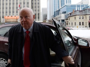 Sen. Mike Duffy, a former member of the Conservative caucus, arrives to court in Ottawa on Feb. 23, 2016. (THE CANADIAN PRESS/Sean Kilpatrick)