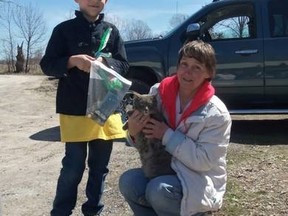 Submitted Photo
Christopher Casey, seen here with Anne Moffatt, shelter manager for the Loyalist Humane Society in Prince Edward County, will be holding the second annual Fill A Truck fundraiser at the Trenton Walmart on May 21.