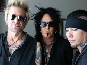 (L-R) James Michael, Nikki Sixx and D J Ashba of the band Sixx AM in Toronto, Ont. on Thursday March 3, 2016. (Michael Peake/Toronto Sun/Postmedia Network)