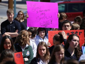 Tim Miller/The Intelligencer
Students from Nicholson Catholic College descended on city hall to hold a silent vigil to raise awareness around social justice issues on Wednesday in Belleville. The vigil was partly in honour of the Sisters of Providence, who for 20 years held a silent vigil each Friday in front of city hall in Kingston.