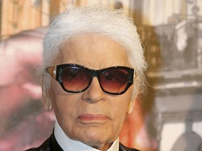 German designer Karl Lagerfeld poses as he arrives at Monte Carlo Sporting to attend the Bal de la Rose in Monaco March 19, 2016. (REUTERS/Eric Gaillard)