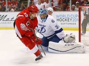 Tampa Bay Lightning goalie Ben Bishop stops a shot by Detroit Red Wings centre Pavel Datsyuk during first-period NHL playoff action in Detroit on April 19, 2016. (AP Photo/Paul Sancya)