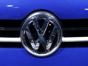A Volkswagen (VW) logo is pictured on a car on the company's booth during the second media day of the 86th International Motor Show in Geneva, Switzerland, in this March 2, 2016 file picture. (REUTERS/Denis Balibouse/Files)