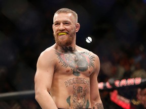 Conor McGregor's abrupt announcement Tuesday that he is retiring from mixed martial arts sent a shockwave throughout the sport. (Eric Jamison/AP Photo)