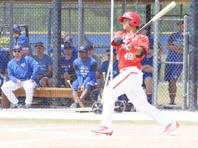Team Canada’s Clayton Keyes hits a home run against the Blue Jays extended spring training team on Wednesday. (EDDIE MICHELS/Photo)
