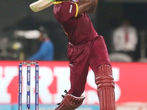 West Indies' Carlos Brathwaite hits a six during the final of the ICC World Twenty20 2016 cricket tournament against England at Eden Gardens in Kolkata, India on April 3. (AP Photo/Bikas Das)