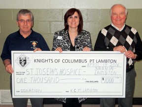 Submitted photo: Grand Knight Frank Johnston, Port Lambton Knights of Columbus, far right presents $1,000 to Maria Muscedere and Bob Murrany of the St. Joseph Hospice of Sarnia. The Knights of Columbus, Council 10873, in Port Lambton made a $1,000 donation to the St. Joseph Hospice of Sarnia Lambton following an information session on April 13. The lecture was sponsored by the Port Lambton Knights of Columbus, Sombra Optimist Club and the Port Lambton C.W.L.