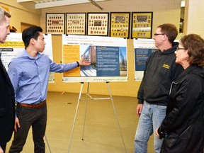 Todd Brown (left) and Cyrus Yen, both planners for Monteith Brown Planning Consultants, were on hand to answer questions from residents such as Bill Appleby and Michelle Chessell (right) about the data the consultants have thus far collected at the Recreation and Leisure Master Plan study open house held last Wednesday, April 20 at the Mitchell Arena. A complete report of the findings will be released in June. GALEN SIMMONS MITCHELL ADVOCATE