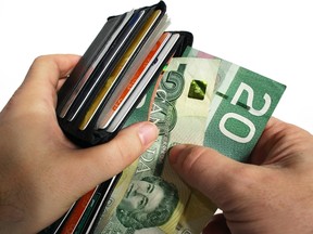 Money wallet Alberta sales tax NDP