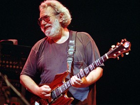 Grateful Dead lead singer Jerry Garcia performs in 1992. (AP Photo/Kristy McDonald, File)