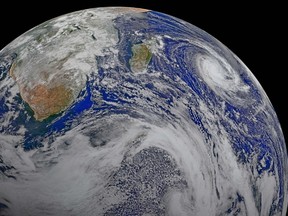 his image provided by NASA Data from six orbits of the Suomi-NPP spacecraft on April 9, 2015 have been assembled into this perspective composite of southern Africa and the surrounding oceans. Tropical Cyclone Joalane is seen over the Indian Ocean. The image was created by the Ocean Biology Processing Group at NASA's Goddard Space Flight Center in Greenbelt, Maryland.