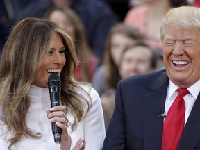 U.S. Republican presidential candidate Donald Trump reacts to an answer his wife Melania gives during an interview on NBC's 'Today' show in New York, U.S. April 21, 2016.  REUTERS/Brendan McDermid