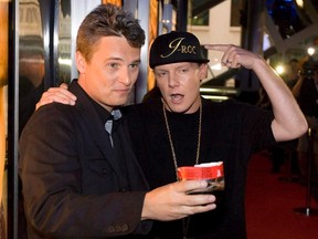 FDirector Mike Clattenburg, left, and actor Jonathan Torrens (as J-Roc) arrive for the Canadian premiere of the film "Trailer Park Boys Countdown to Liquor Day" in Toronto on Monday, September 21, 2009. Torrens says he's packing up and leaving the trailer park behind.The Charlottetown-born actor announced on Twitter that he will exit the cult comedy series "Trailer Park Boys" after 10 seasons of playing J-Roc, an aspiring white rapper who's one of the residents at the Sunnyvale Trailer Park. THE CANADIAN PRESS/Darren Calabrese