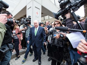 Senator Mike Duffy departs the Ottawa Courthouse after being acquitted of the 31 charges he faced on Thursday April 21, 2016. Errol McGihon