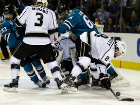 Los Angeles Kings' Drew Doughty recovers a puck shot by San Jose Sharks' Melker Karlsson during first-period NHL playoff action in San Jose on April 20, 2016. (AP Photo/Ben Margot)