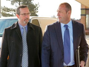 Lawyers Michael Lacy, left, and Peter Brauti leave the Finch Ave. courthouse in Toronto March 20, 2015. (Dave Thomas/Toronto Sun)