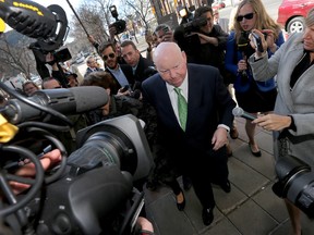 Sen. Mike Duffy arrives at the Ottawa courthouse Thursday April 21, 2016. (Tony Caldwell)