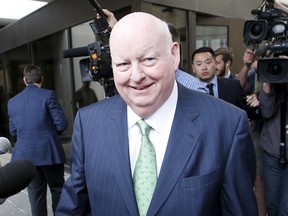 Sen. Mike Duffy leaves the courthouse after being cleared of bribery and fraud charges in Ottawa, Canada, April 21, 2016. (REUTERS/Chris Wattie)