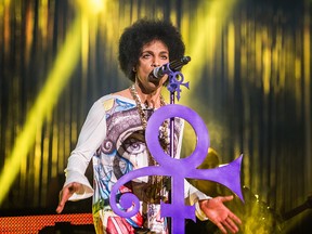 Prince performs live in Birmingham at the LG Arena in May 2014 on his "Hit and Run part II" tour. (WENN)