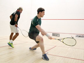 Gino Donato/Sudbury Star
Michael McCue of Sudbury, representing Canada, returns the ball to Eric Galvez of Mexico during quarter-final action at the 2016 Northern Ontario Open Squash PSA Tournament on Thursday. Play continues with Friday night semi-finals at 6:30 and 7:30 p.m., and the championship affair Saturday afternoon at 3 p.m. Alll of the action takes place at the Sudbury YMCA.