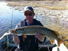 Little Current's Jeff Crowell shows a spring ice-out pike. Bruce Heidman/The Sudbury Star
