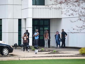 Friends and employees gather outside of Paisley Park, U.S. music superstar Prince's estate in Chanhassen, Minnesota April 21, 2016. REUTERS/Craig Lassig