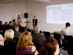 Ellen Martin and AJ Tibando (from left to right) give a presentation on the state of youth entrepreneurship in Oxford County at the Woodstock Art Gallery on Thursday. (BRUCE CHESSELL/Sentinel-Review)