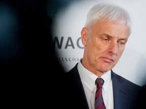 CEO of Volkswagen Matthias Mueller attends a news conference conference Volkswagen company in Wolfsburg, Germany, Friday, April 22, 2016. Mueller said as he released the headline earnings numbers that the company remains "fundamentally healthy" and that he is "convinced that Volkswagen has what it takes to overcome its challenges." (Julian Stratenschulte/dpa via AP)