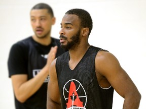 London Lightning guard Akeem Scott during practice with the team at the Central YMCA in London, Ontario on Thursday April 21, 2016. At left is Ryan Anderson (MORRIS LAMONT, The London Free Press)