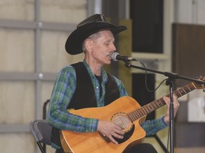 Jackson Mackenzie of Vilna plays a few country tunes for the audience at the Volunteer Celebration event at the Heritage Pavilion in Stony Plain on April 14. - Photo by Marcia Love