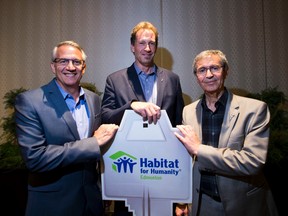 Local homebuilders (L-R) Lloyd Dumonceaux, Vice President, Pacesetter Homes; Sandy Ladd, Vice President of Housing, Daytona Homes; and Reza Nasseri, CEO, Landmark Builders have each donated a home to Habitat for Humanity.