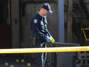 A woman's torso was found behind a butcher shop at Broadview and Gerrard on Tuesday. (Craig Robertson/Toronto Sun/Postmedia Network)