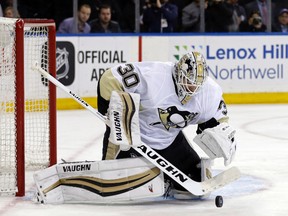 Penguins goalie Matt Murray makes a save during against the Rangers in Game 4 of the first round playoff series at Madison Square Garden in New York City on Thursday, April 21, 2016. (Adam Hunger/USA TODAY Sports)