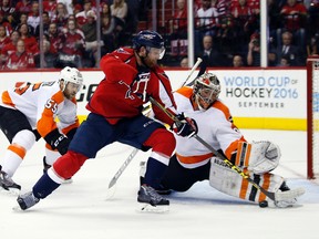 Capitals defenceman Karl Alzner can't score past Flyers goalie Michal Neuvirth during second period of Game 5 in a first round NHL playoff series in Washington on Friday, April 22, 2016. (Alex Brandon/AP Photo)