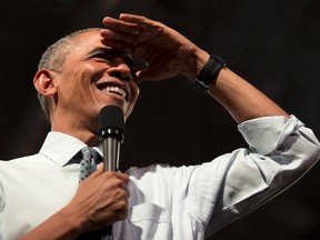 President Barack Obama looks to the audience for his next question as he speaks during a town hall meeting at Lindley Hall, the Royal Horticultural Society, in London, Saturday, April 23, 2016.  Obama held the town hall-style event in London taking questions on diverse subjects from the predominantly young people in the audience.(AP Photo/Carolyn Kaster)