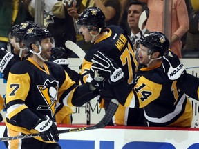 Penguins centre Matt Cullen (7) celebrates his goal with the Pens bench against the Rangers during the second period in Game 5 of the first round NHL playoff series in Pittsburgh on Saturday, April 23, 2016. (Charles LeClaire/USA TODAY Sports)