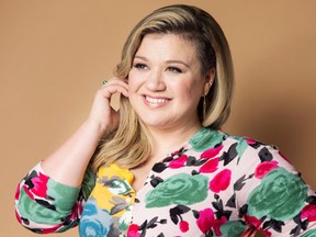 FILE - In this March 4, 2015 file photo, American singer and songwriter Kelly Clarkson poses for a portrait to promote her album "Piece by Piece" in New York. On Thursday, April 14, 2016, Clarkson announced on Twitter the birth of her second child, a baby boy named Remington Alexander Blackstock. He was born on Tuesday and is Clarkson's second child with husband Brandon Blackstock. The couple also have a daughter named River Rose who was born in 2014. (Photo by Victoria Will/Invision/AP, File)