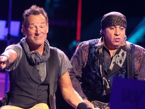 Bruce Springsteen, left, and Steven Van Zandt perform in concert with the E Street Band during their “The River Tour 2016” at the Royal Farms Arena on Wednesday, April 20, 2016, in Baltimore. (Photo by Owen Sweeney/Invision/AP)