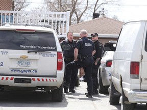 Members of the Greater Sudbury Police Service continued to investigate at a home on Main Street in Val Caron  where an arrest was made in Sudbury, Ont. on Sunday April 24, 2016. Gino Donato/Sudbury Star/Postmedia Network