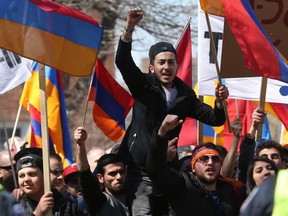 Demonstrators, commemorating the 101st anniversary of the Armenian genocide, marched to the Turkish Embassy in Ottawa on Sunday, April 24, 2016 and demanded the Turkish government acknowledge its role in the 2015 deaths. JEAN LEVAC / .
