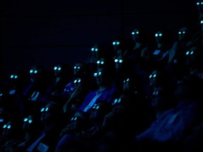 Visitors to the Telus World of Science wear 3D glasses during the unveiling of the facilities new IMAX Laser 4K Projector, in Edmonton, Alberta, October 14, 2015. (David Bloom / Postmedia) --- Begin Additional Info --- Visitors to Edmonton's Telus World of Science wear 3D glasses Oct. 14 during the unveiling of the facility's new Imax laser 4K projector.