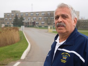 Retired Regina Mundi secondary school teacher and coach Gino Nicodemo has started a petition to halt destruction of his old school on Wellington Road in London. (Mike Hensen/The London Free Press)