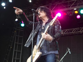 Tom Keifer of Cinderella plays for an appreciative crowd at Rock The Park in Harris Park in London, Ont. two years ago. Keifer will play Club Regent later this year. (CRAIG GLOVER/The London Free Press file photo)