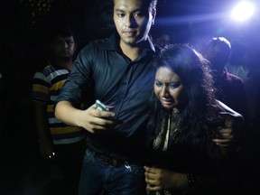 Unidentified assailants fatally stabbed two men in Bangladesh's capital Monday night, including a gay rights activist and U.S. Agency for International Development, (USAID) employee Xulhaz Mannan, left, police said. (AP Photo)