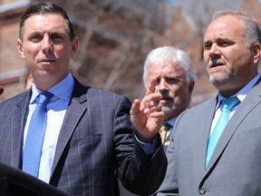 Tim Miller/The Intelligencer
Prince Edward-Hastings MPP Todd Smith listens as Progressive Conservative (PC) leader Patrick Brown speaks during a rally at Queen's Park on Thursday, April 14 in Toronto. Brown has added the Natural Resources and Forestry portfolio to Smith’s list of responsibilities.