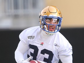 Winnipeg Blue Bombers running back Andrew Harris runs with the ball during a mini camp in Winnipeg, Man. Monday April 25, 2016.
Brian Donogh/Winnipeg Sun/Postmedia Network