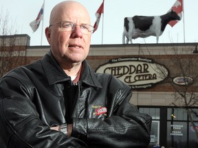 Jacques Leury, manager of Cheddar et Cetera, says the store is shutting down and its iconic cow sign will be on the move.