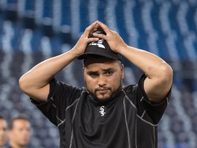 Chicago White Sox catcher Dioner Navarro stretches during batting practice before a game against the Toronto Blue Jays at Rogers Centre on April 25, 2016. (NICK TURCHIARO/USA TODAY Sports)