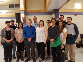 The Cochrane Ducks Unlimited Committee made up of back row: Bruno Ouellet (left to right), Andy McNabb, Kourtney Cotgrave, Lynn Bailey, and Robert Watson. Front row:  Suzy Ouellet, Lily McNabb, Charlie Burkholder, Joelle Cotgrave, James Lim, Michele Lim and  Chris Genier all worked hard on the 29th edition of the Ducks Unlimited Dinner and Auction.