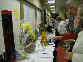 Tastings guests peruse through a potpourri of silent auction gifts during Tastings, Big Brothers Big Sisters' signature evening of food, wine and beer, which takes place this year on Apr. 29.
submitted photo for SARNIA THIS WEEK